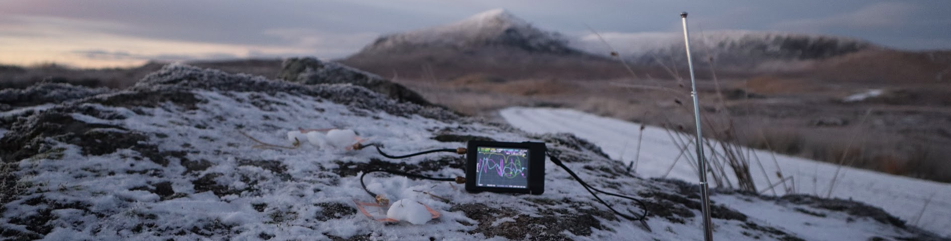 Electronic devices in a snowy mountainous environment