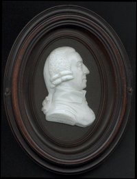 A glass paste sculpture relief medallion of Professor Adam Smith, designed by the Scottish engraver James Tassie, 1789.  Inscription on the base of the cameo says 