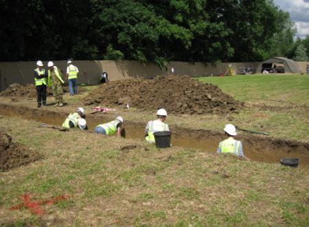 Excavations to evaluate the extent and preservation of a WWI mass grave at Fromelle, France
