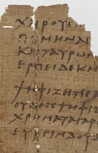 Detail of papyrus fragment, collection of songs written down in the 3rd century. (MS Gen 1026/1) Links to more information about this item.
