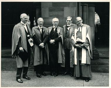Fitzroy MacLean with others in the Cloisters