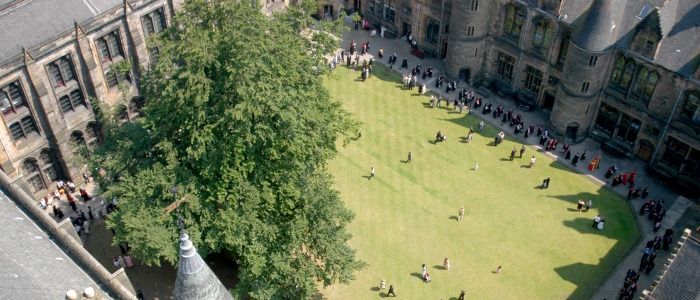 View of graduates in quadrangle from the roof of the main building