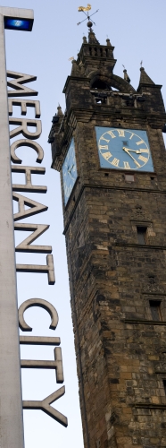 Merchant city sign and Tollbooth clock tower
