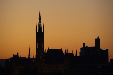 University of Glasgow main building silhouette at sunset
