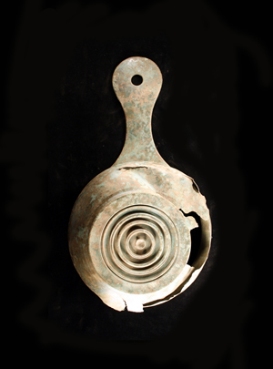 Metal patera excavated from Castle Craig broch.