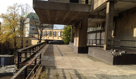 Image of the Adam Smith building and car park access