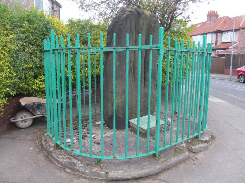 Robin Hood’s Stone, a roadside caged megalith in a suburb of Liverpool