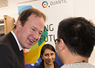 Jesse Norman MP talking with QuantIC staff.