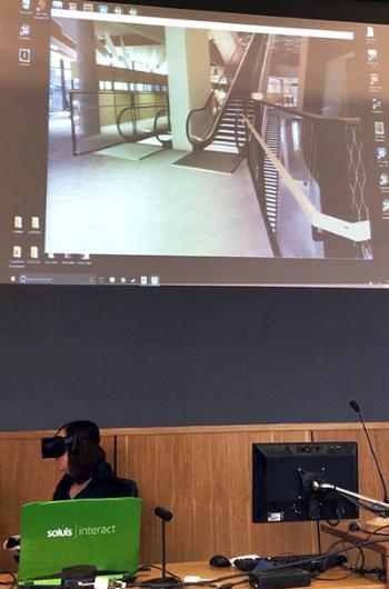 Image of a visitor trying a virtual reality fly-through of the Learning and Teaching Hub