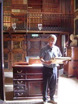 Professor Douglas Gifford (honorary Librarian of Walter Scott's Library) looks through materials in Scott's study (where most of the Waverley novels were written!)