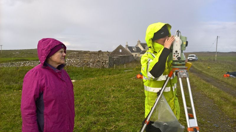 Peta Glew and local volunteer surveying