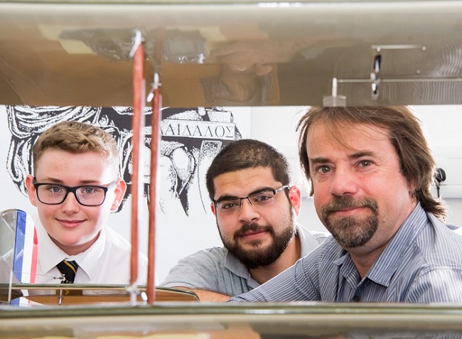 Left to Right: Ben Croxford, Clydebank High School; School of Engineering student Sharraf Eltelbani and Professor Tony Pollard with Bristol Flighter model.