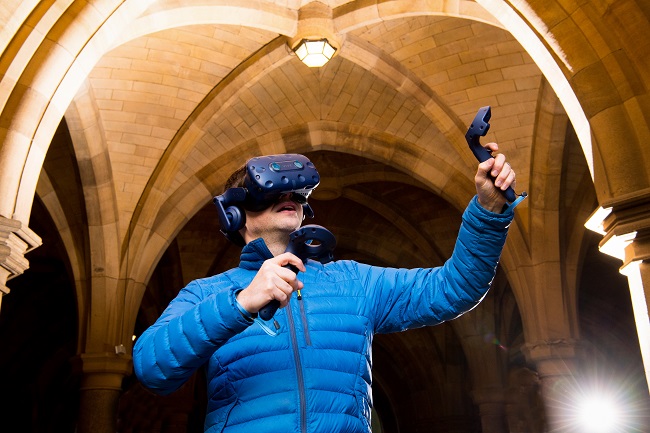 Photo of Dr Neil McDonnell in Cloister for the announcement of funding for Virtual Reality Classrooms and Teaching Resources to be created by University of Glasgow. 650