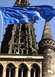 The University tower with an EU flag flying
