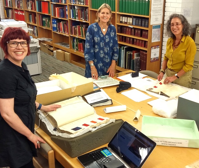  Anita Quye (left), Jenny Balfour-Paul (middle) and Dominique Cardon (right) with the early 18th C. Crutchley Archive at SLHLA.
