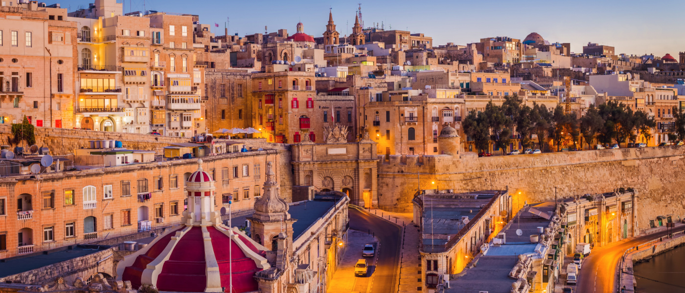The traditional houses and walls of Valletta, the capital city of Malta on an early summer morning before sunrise with clear blue sky [Photo: Shutterstock]