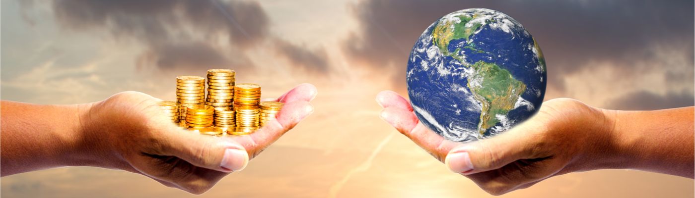 Image of two hands, one holding money and the other holding the world globe