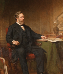 Portrait of Charles Randolph seated at a table