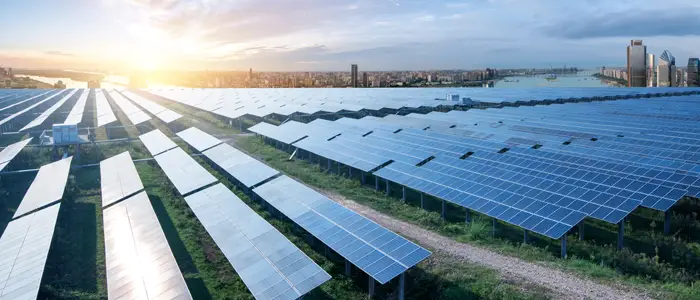 Eco-environmentally friendly green energy of sustainable development of solar power plant with Shanghai skyline