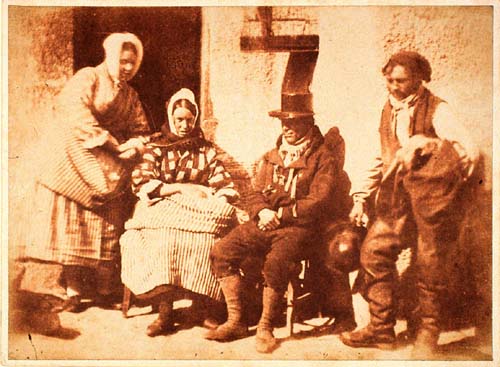 Mrs Logan; Mrs Seton; two unidentified men; "Fish-Wives & Fishers" [SNPG Finlay album 3 p. 126]; follow the link for more information about this photograph