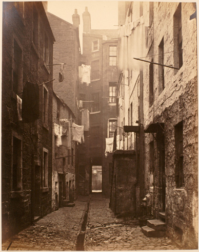 Image of plate 7 of Closes and Streets: Shows washing hanging above a back court