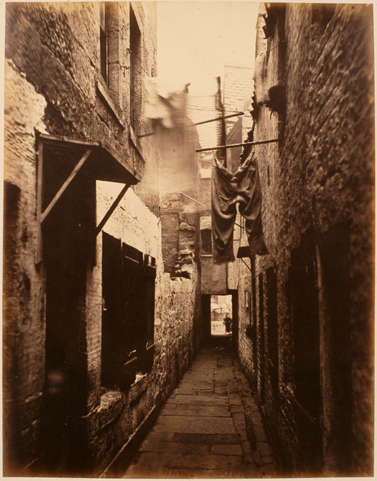 Image of plate 10 of Closes and Streets: wet and dry clothes hang above a narrow alley