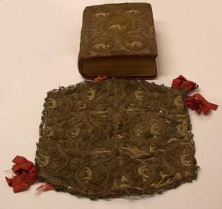 The Bible with the embroidered cloth.