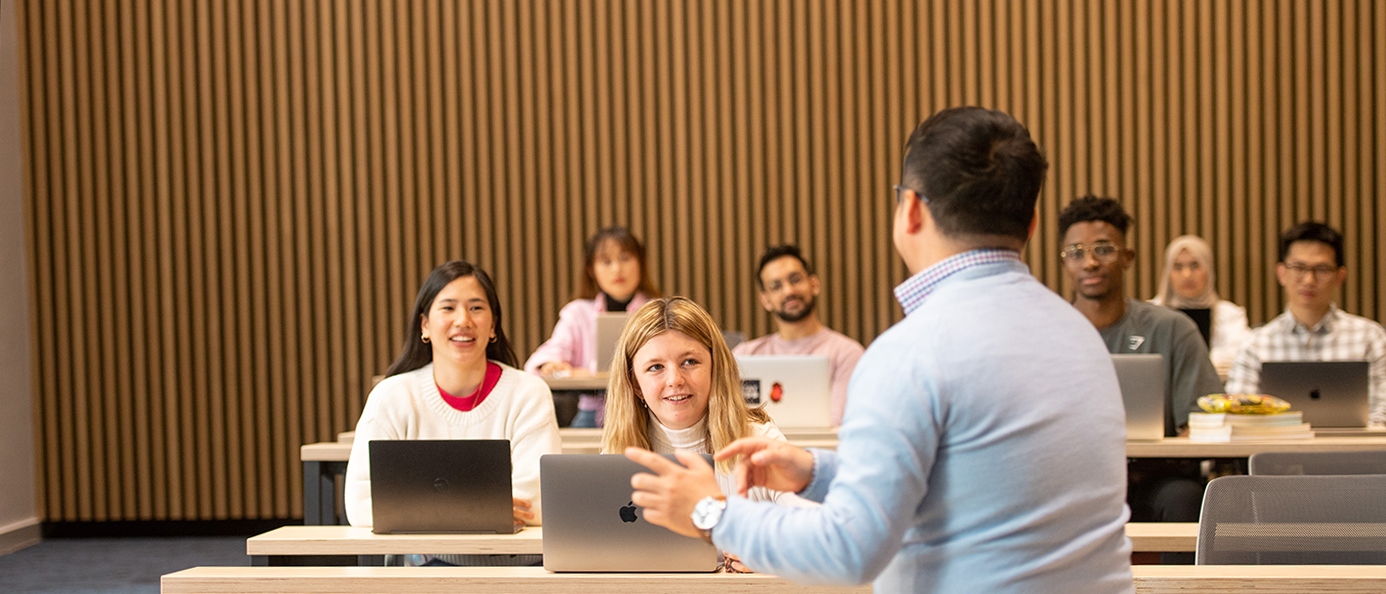 Students and a tutor in a lecture theatre