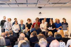 Choir singing at opening of Clarice Pears Building