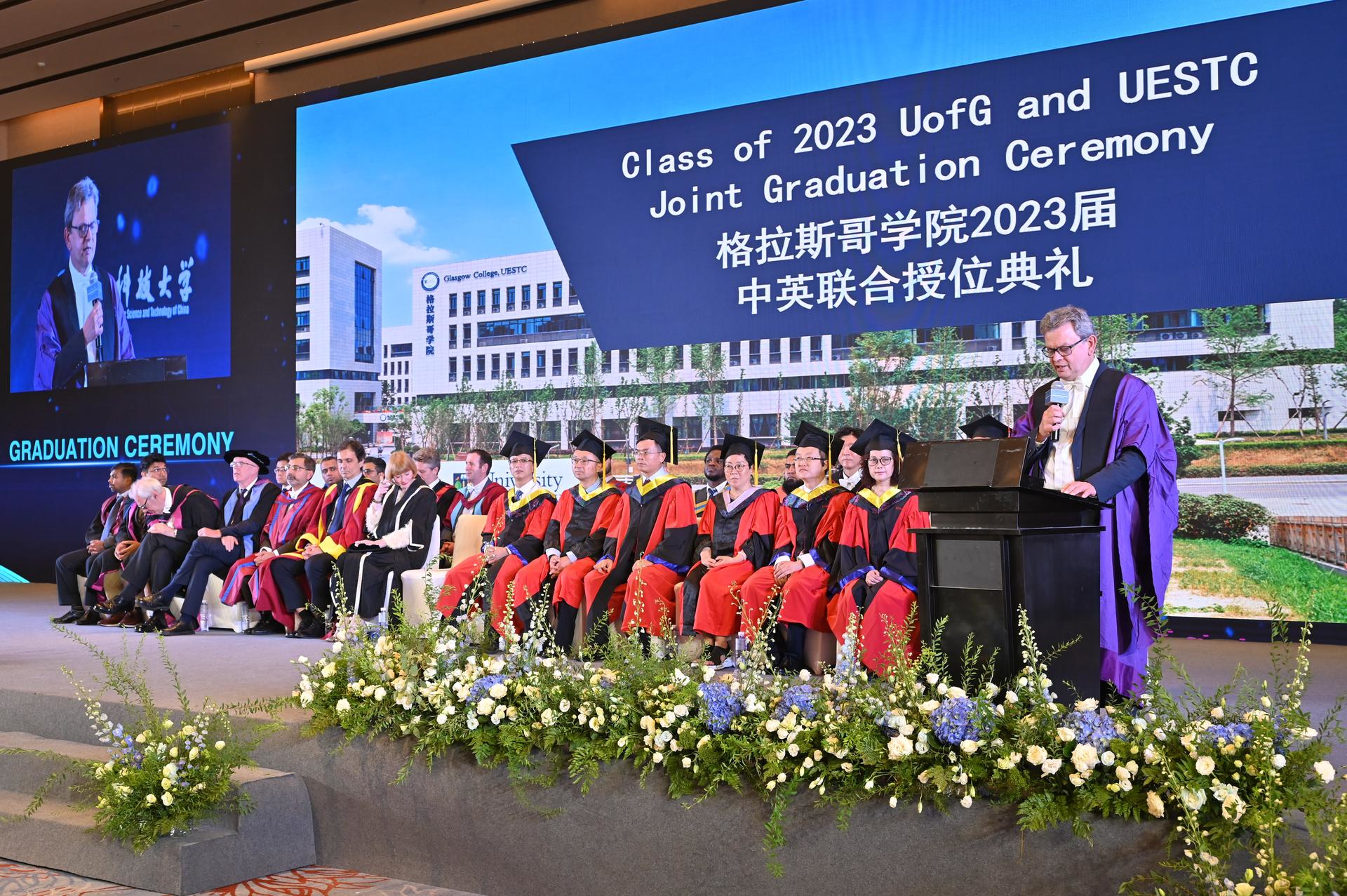 Glasgow College UESTC Senior Management, HoS and Teaching Staff on stage in Chengdu for Graduations 2023