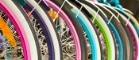 Close up of bike wheels in bright colours