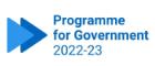 Logo with two overlapping arrows and the text 'Programme for Government 2022-23'