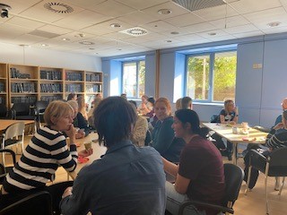 Image of people drinking coffee