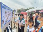 Public engagment board staff and visitors 