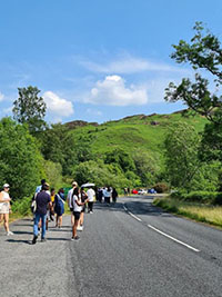 Students walking along a path in Dumfries