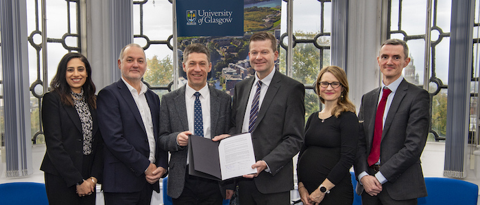 A photograph showing representatives of the University of Glasgow and Glasgow Clyde College at the signing ceremony for a new memorandum of understanding between the two institutions