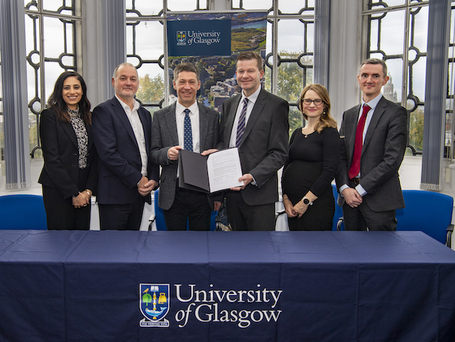 A photograph showing representatives of the University of Glasgow and Glasgow Clyde College at the signing ceremony for a new memorandum of understanding between the two institutions