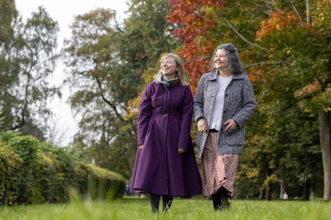 Prof Hester Parr and Catherine, one of the participants in the Wintering Well workshops, walk together in Kelvingrove Park