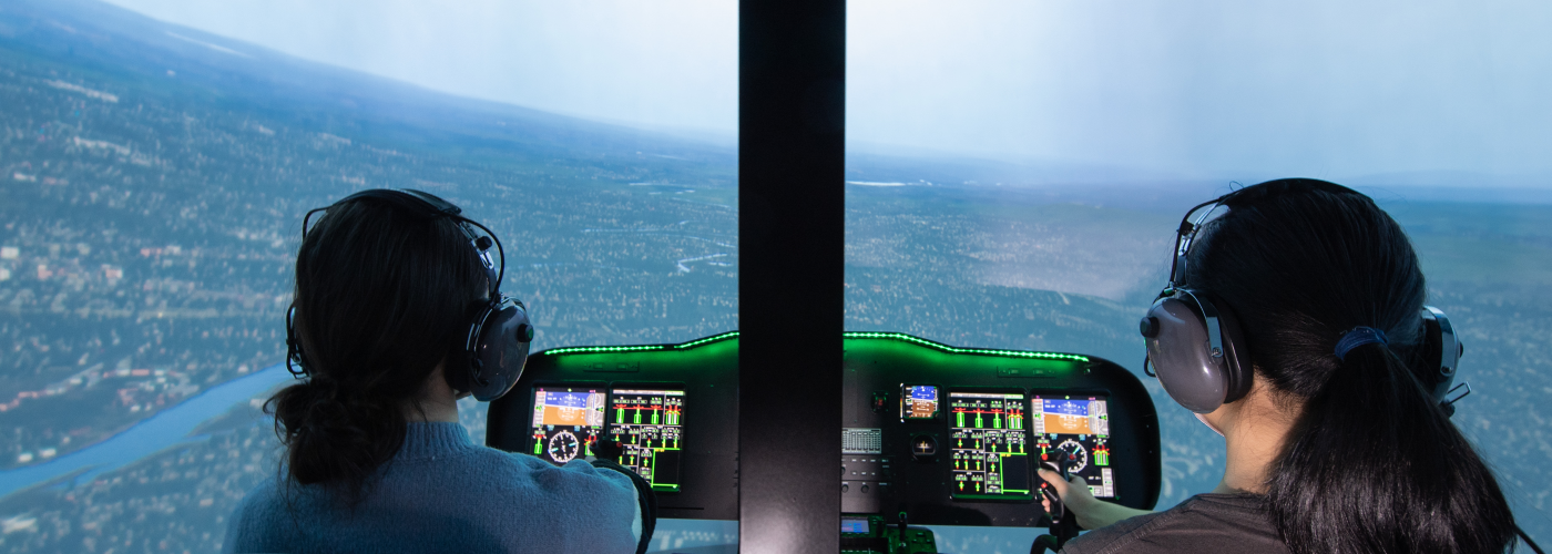 Engineering students in flight simulator