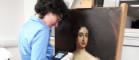 Researcher at work analysing an oil painting in the Kelvin Centre technical art history laboratory
