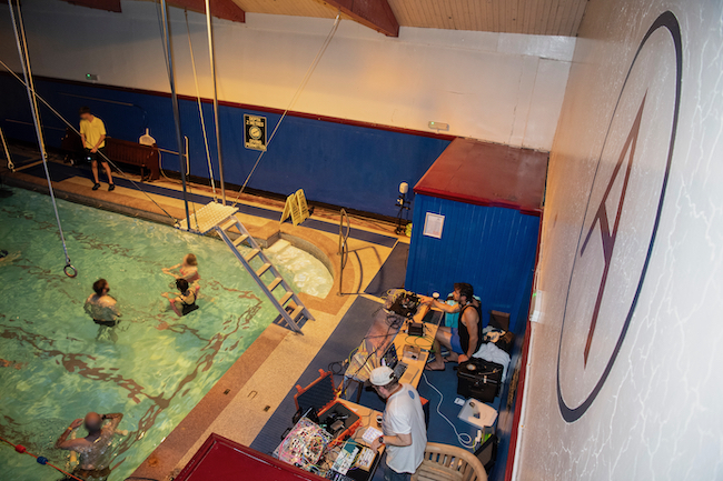 Swimmers at Arlington Baths Club enjoy the Swimming with Gravitational Waves performance