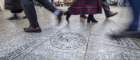 People walking over the Adam Smith Memorial paving stone Source: Charlotte Morris. 