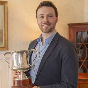 WCA winner Daniel Crawford holding his cup