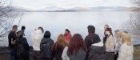 Group of students stand on the banks of Loch Lomond
