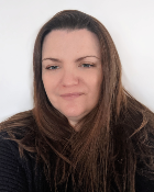 A head and shoulders shot of Dr Susan Gannon against a plain, white background