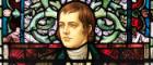 A stained glass portrait of Robert Burns.