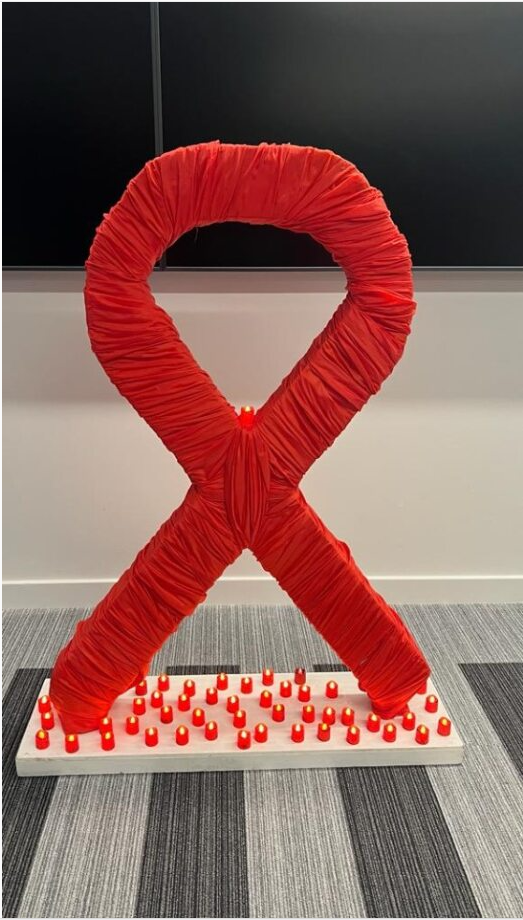 Photo of World AIDS Day WAD ribbon memorial display