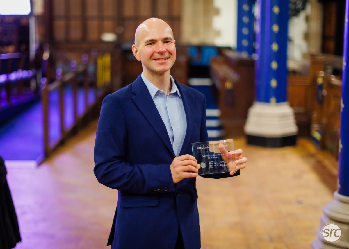 Dr Colin Herd with the ‘Overall Contribution to Teaching’ Award at the SRC Student Teaching Awards 2023