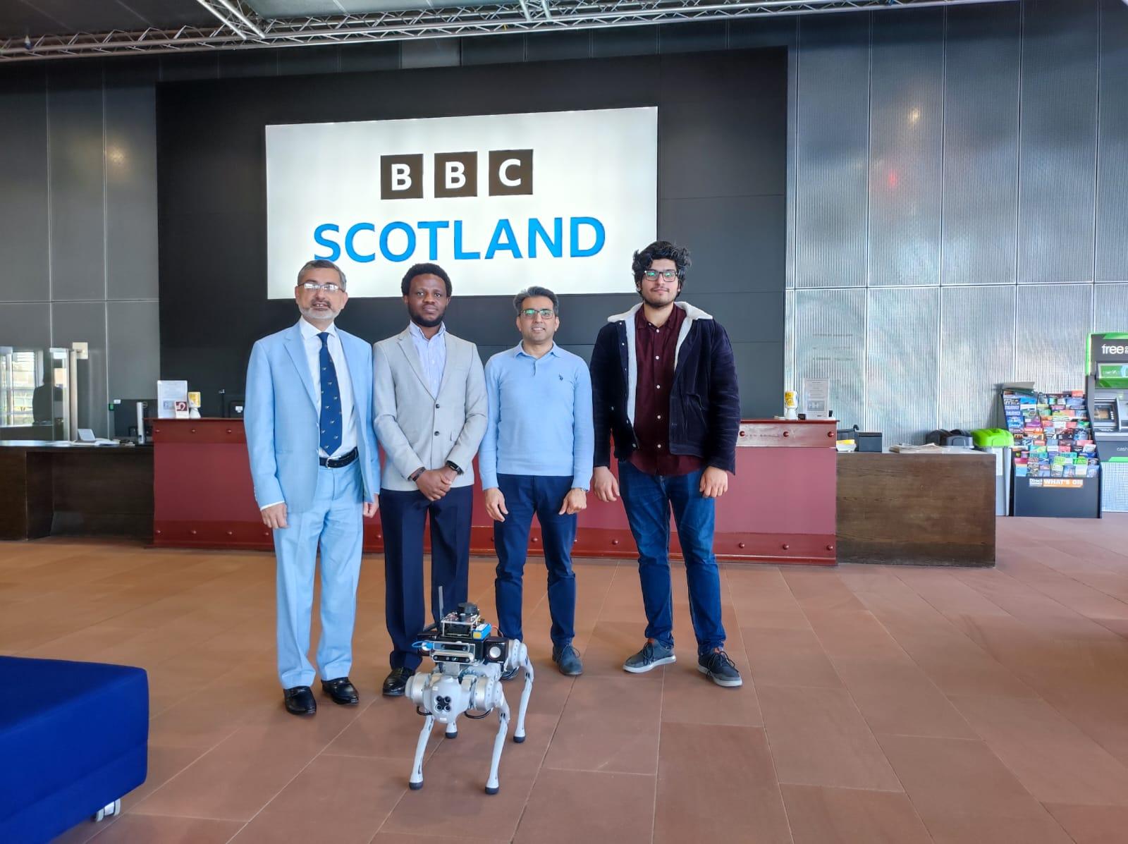 The project team and Robbie the RoboGuide at the BBC Scotland studios