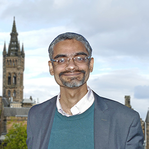 Prof Sreevas Sahasranamam profile photo with a view of the University of Glasgow tower in the background